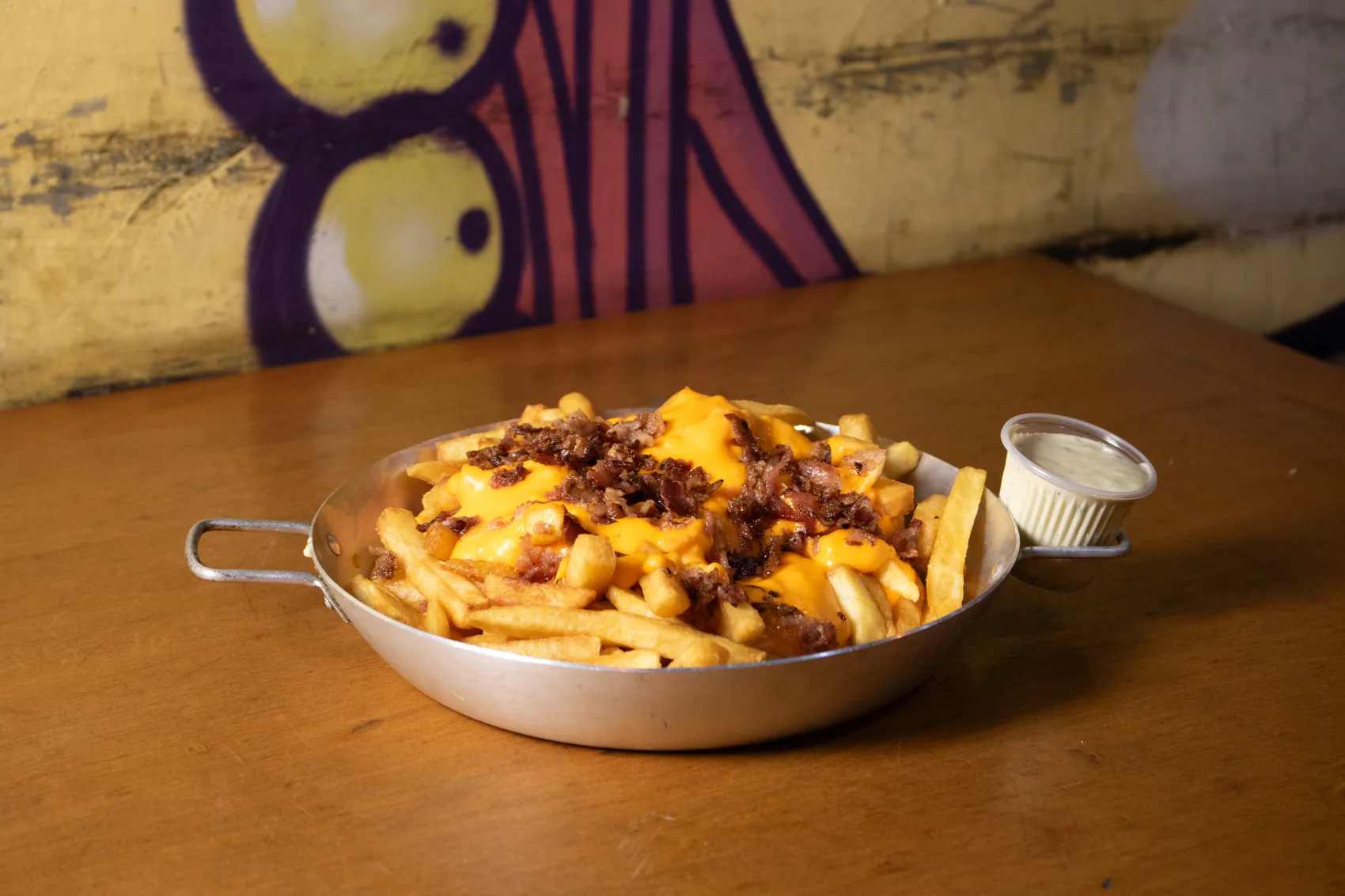 Batata frita com cheddar e bacon